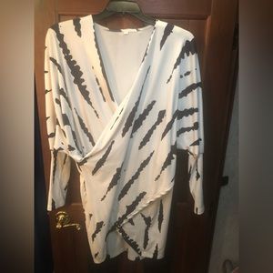 Long sleeve sweater with black leggings